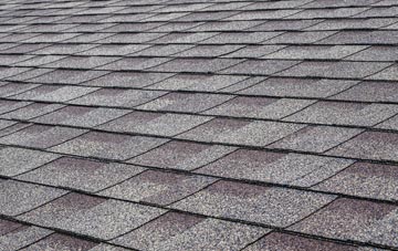 Broad tiles for shallow pitch roofing